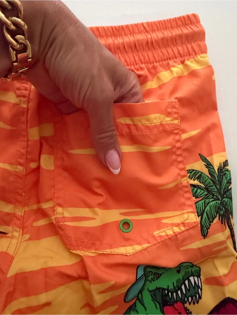 (NWT) Old Navy Boy’s Dinosaur 🦖 Swim Trunks in Orange/Multi, Large (10/12)